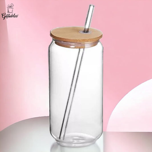 Glass jar with straw